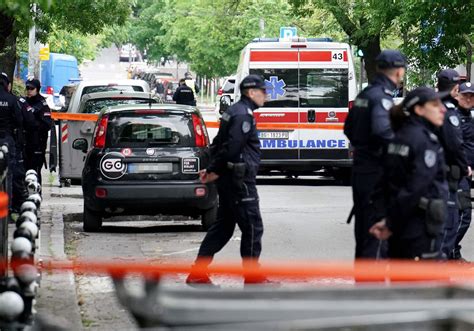 Serbian police say 8 children, guard killed in shooting at Belgrade school