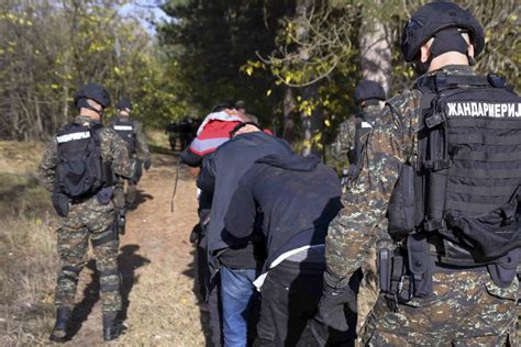 Serbian police say some 3,400 migrants, weapons, ammunition found in week-long raids