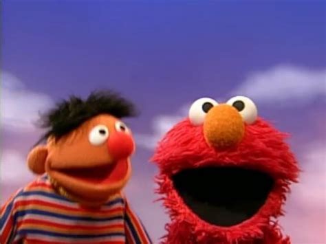 SCENE 1: Today, “The Wide World of Sesame Street” will be covering numbers. Reporter Telly Monster is asking what people’s favorite numbers are. He first visits the home of Polly Darton, but her back up group, the Get-Along Little Doggies, opens the front gate, smashing Telly against the wall.Polly addresses the camera and sings about how singing makes …. 