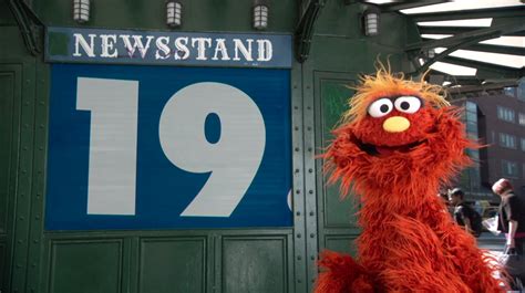 Elmo is a popular Sesame Street muppet who is three and