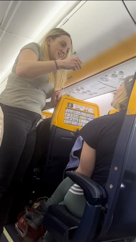 Sexy tit flashing in a plane video. .  ...