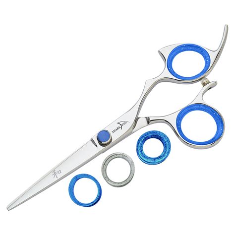 Shark shears. Salon Value: $799.95 Description: RIGHT HAND PROFESSIONAL NON-SWIVEL BLUE 5.5 CUTTING SHEAR AND 15 TOOTH DEBULKING SHEAR WITH CASE AND ACCESSORIES All Mystery Box and Auction Item Sales are Final (No Returns). 