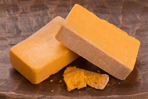 Sharp cheddar cheese. Mild cheddar has a milder, buttery flavor, while sharp cheddar has a tangy, nutty flavor with a stronger taste. This difference in flavor can significantly impact dishes like cheese sandwiches, cheese boards, and pasta dishes. 3. Texture. The aging time also affects the texture of the cheese. 