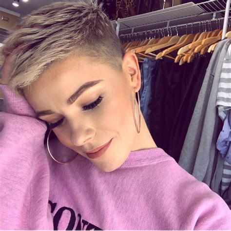 Jean Claude/Instagram. Gray is a great color for short spiky hair because it is not only for the mature woman, but is a trendy color regardless of your age. This spiky cut works well with a little more length. The front is swept up and to one side while the entire back of this look is spiked straight out.. 