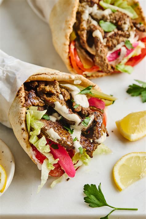 Shawarma meat. Heat a large heavy duty pan over high heat. Add the chicken mixture to the pan and cook on high heat for 8-10 minutes or until the chicken is browned and cooked through. To make the shawarma white sauce: Add all the ingredients to a blender and blend until smooth and creamy. 