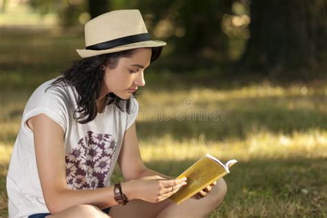 She Loves To Read a Book and Relax in Nature Stock Image Image of