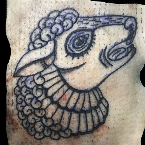 Sheep outline tattoo