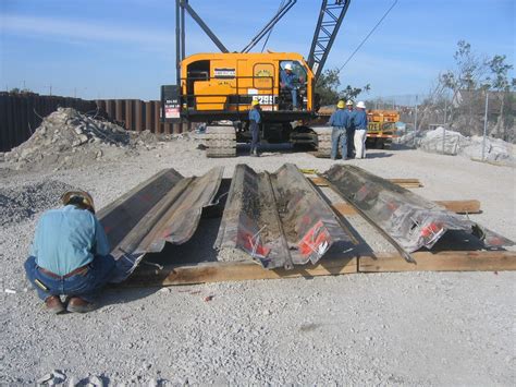Sheet pile Foundation material pulled from the breached ar… Flickr