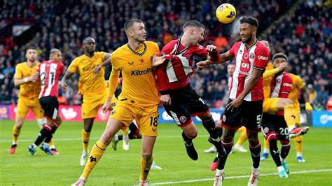 Sheffield United scores penalty in 10th minute of stoppage time to earn first win in Premier League