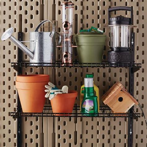 18. • Rubbermaid Outdoor Metal Backyard Shed Accessories Shelf, Individual, Black (2 Pack) and a Rubbermaid Storage Shed Space Saving Large Mounted Power Tool Holder Accessory (2 Pack) • Small metal shed accessory can hold up to 20 pounds and helps strengthen your shed's shelves. • Excellent way to organize and keep your shed tidy.. 