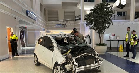 Sheriff: Vehicle crashes in airport terminal, driver charged