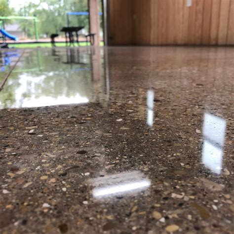 Shiny concrete floor. Polished Concrete Flooring · Exposed Aggregate & Highly Reflective · Extremely Durable · Easy to Clean & Maintain · Perfect for Commercial &... 