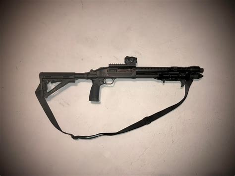 Shockwave sbs. It is NOT a shotgun, as it is not intended to be fired from the shoulder. Next, add a 14-inch barrel so the overall length is just under 26½ inches. The length being greater than 26 inches disqualifies the gun from being an AOW. So, the BATFE declares that you now have a “Non-NFA Firearm.”. The Shockwave is not a shotgun, nor a handgun ... 