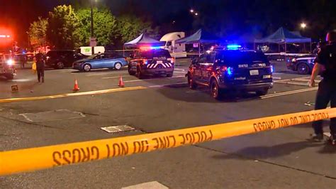 Shooting in Seattle parking lot injures 5 people, including 2 critically, police chief says