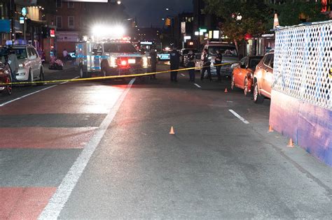 A woman was wounded by a stray bullet outside a Brooklyn bodega early Wednesday, cops said. A gunman dressed in black opened fire on a group of people outside the bodega on Nostrand Ave. near .... 