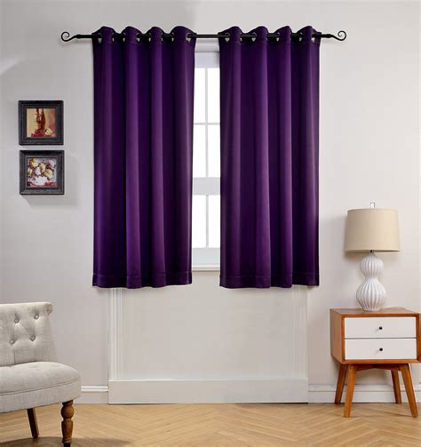 Ready-made curtains generally come in one of three standard drop lengths: 54 inches, 72 inches or 90 inches. A 54-inch drop should be level with the sill, a 72-inch drop should fal...