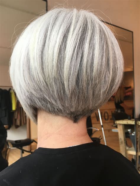 Short bobs for gray hair. Blending away gray hair is best done by various forms of highlighting, especially for blondes. Adding several shades of color through highlighting lets gray hair mix in naturally w... 