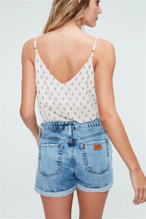 Short jeans destroyed com barra dobrada é prático ... - Pinterest