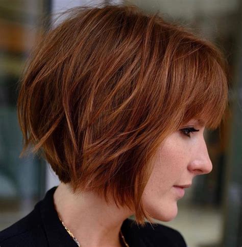 Short layered bobs for women. 12. Short Choppy Bob with Bottleneck Bangs. This textured choppy bob works best for finer hair as it boosts the volume and paired with gentle bottleneck bangs has a face-framing effect. This cut makes your mane look fuller and unlike a blunt bob is super low maintenance. 