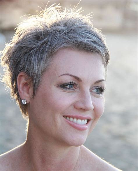 Short pixie cuts for gray hair. 13. Short and Stylish. Here is another short afro hairstyle for gray-haired ladies. Layer the white strands and add a touch of dark gray or black to them to create a pretty salt and pepper appeal. Finger-curl the tips only to contrast against the remaining fluff. Stylish and elegant! 14. 