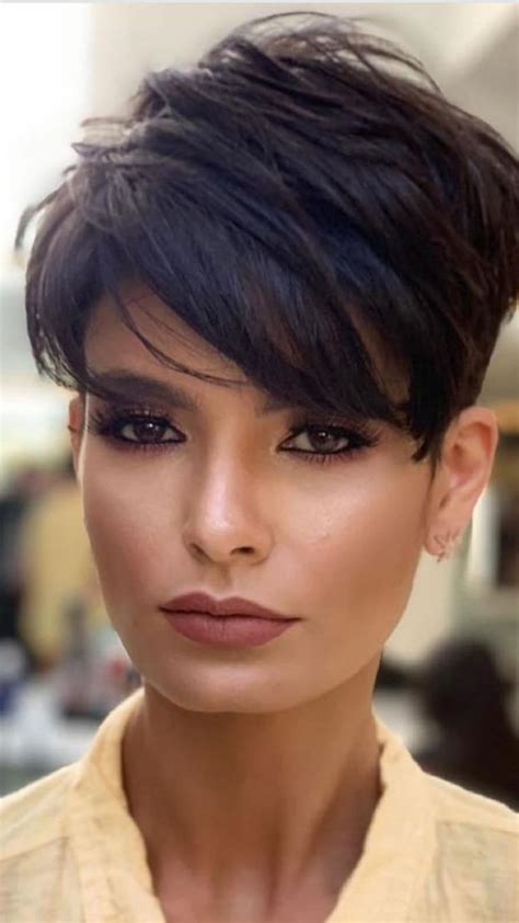40 Lovely Pixie Haircuts That Prove Shorter Can Indeed Be Better 1. Wavy asymmetrical pixie. An easy way to add some interest to a classic pixie is with an asymmetric cut. Leaving one... 2. Layered pixie with long side-swept bangs. This is another slightly longer pixie that gives you a little more .... 
