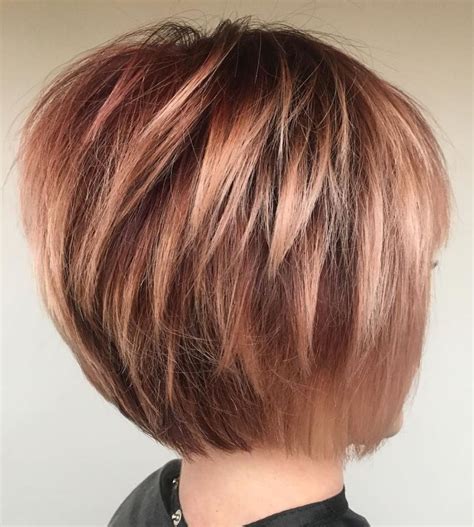 Short thick bob haircut. 29. Textured V-shaped Bangs and Faux Hawk Haircut. A faux hawk haircut is an excellent silhouette for thick hair, as long as the top is fully textured with layers. If you aim on wearing a faux hawk daily, you can continue the pointed shape with short V-shaped bangs in the front. 