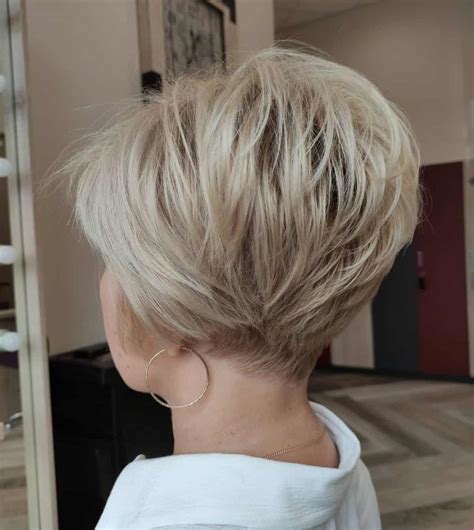 Blonde Shaggy Pixie Cut. This hairstyle is simi