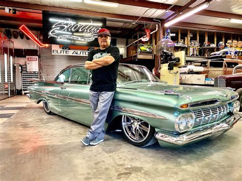 Shorty Ponce (left) starts a car that will be featured in the upcoming reality TV show “Shorty's Dream Shop” while camera operator Ryan Fedor films him at Shorty's Custom Paint in Midlothian.