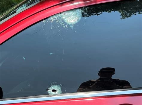 Shots fired at unmarked St. Louis police vehicle, officer suffers cuts