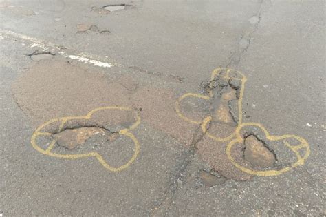 Should St. Paul residents spray paint potholes to alert drivers? City says no.