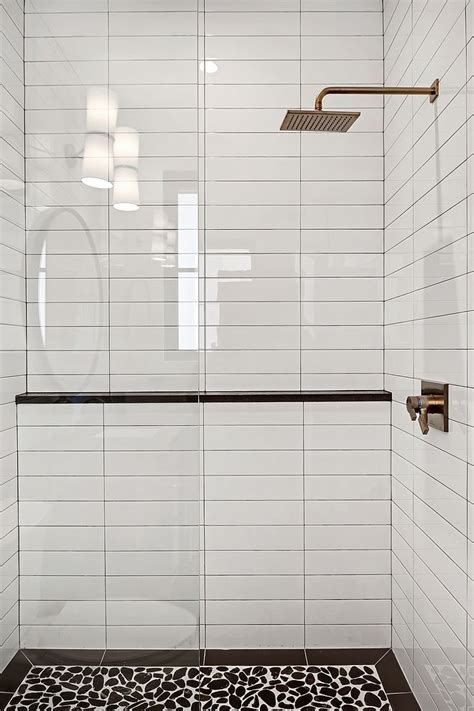 Shower Tile 4x16 white subway tile in a horizontal stack pattern and