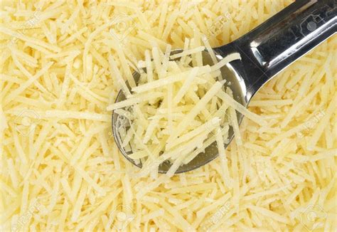 Shredded parmesan. If serving with pasta, cook 8 ounces pasta while you make the sauce. In a small or medium saucepan over medium heat, melt the butter. Add the grated garlic and cook 30 seconds until fragrant but not browned. Add the flour and whisk constantly for 1 minute to 90 seconds, until bubbly and golden. 