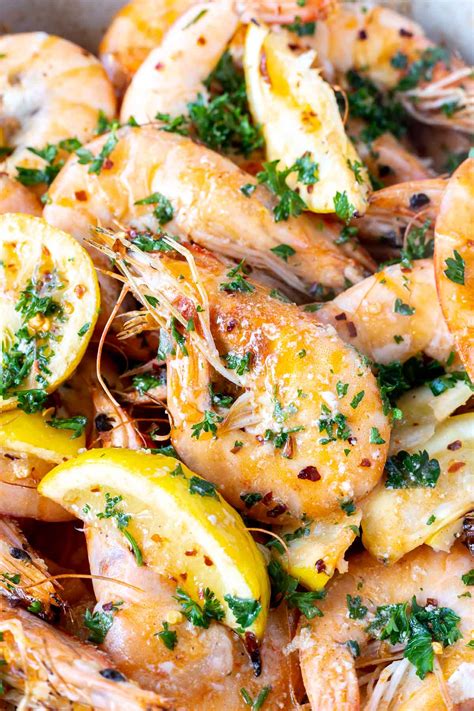 Shrimp with head on. Using kitchen shears, trim off the legs and the sharp pointy part at the top of the head. Then devein the shrimp by using a toothpick to carefully expose and pull it … 