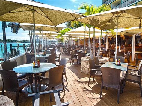 Shuckers miami florida. As about a hundred fans were rooting on the Miami Heat on the deck of Shuckers, Miami's favorite waterside sports bar, when the structure collapsed just before halftime, at around 9:45 p.m. Twenty ... 