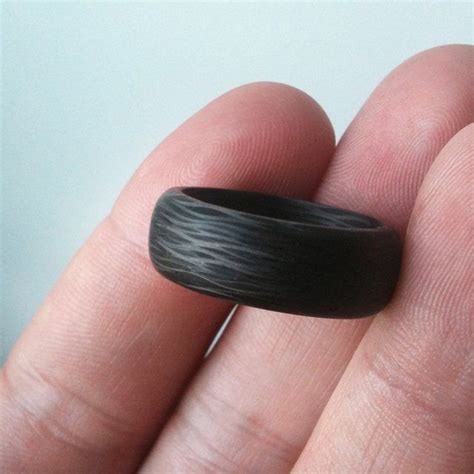 Sidecut Solid Carbon Fiber Ring by Black Badger(via Fancy)