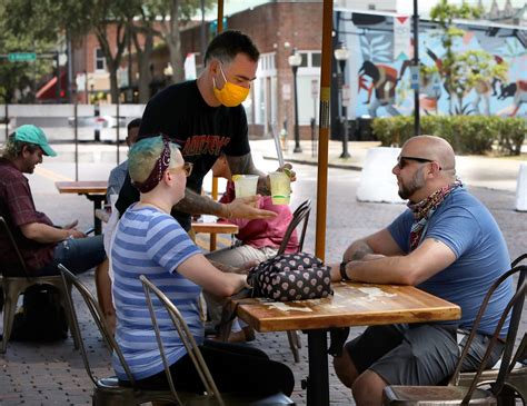 Sidewalk cocktails in open containers OK