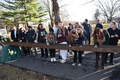 Siena students sign beam for new science building
