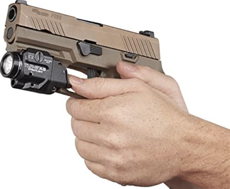 This modular, striker-fired pistol features a compact LIMA grip module with an integrated laser that is activated when you grip the pistol. The P320 LIMA offers a compact slide, and contrast sights.
