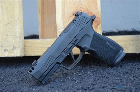 With an innovative new magazine design the P365-XMACRO COMP packs a full-size 17+1 round capacity into the thin, iconic profile of the P365. ... Sig Sauer P365 X Macro Comp; SIG SAUER P365 X-MACRO .... 