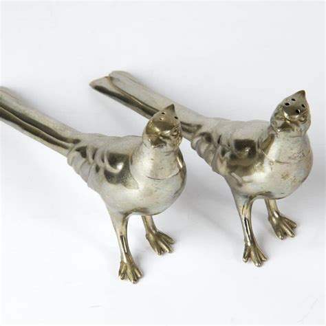 Silver bird salt and pepper shakers. Long Tail Pheasant Bird Salt & Pepper Shaker Set | Vintage Silver Tone Cast Metal | Rustic Patina | Hollywood Regency Baroque - Unmarked. (355) $15.12. $18.00 (16% off) 