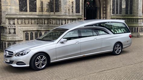 Silver funeral cars. .  ...