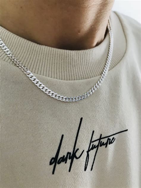 Silver necklace for men. Feb 5, 2024 ... One of the most famous silver chains in media is that worn by Connell Waldron in Hulu's Normal People. It's a simple, unadorned chain, ... 