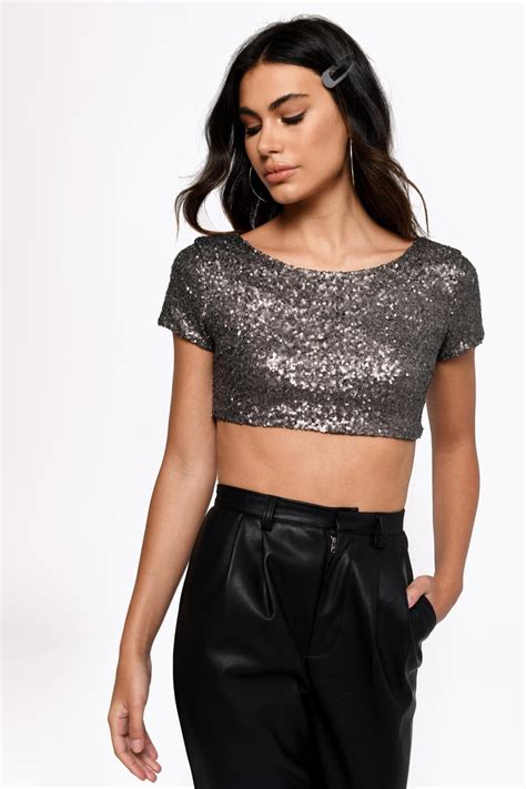 Silver top. Glitter Sheer Mesh Top Women Short Long Sleeve Sexy Shirt See Through Clubwear Tee Slim Blouse. 4,035. 100+ bought in past month. 1798. List: $30.98. Save 15% with coupon (some sizes/colors) FREE delivery Tue, Jan 30 on $35 of items shipped by Amazon. Or fastest delivery Mon, Jan 29. 