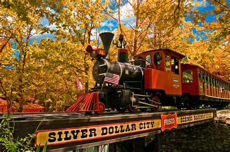 Silverdollarcity - The new attraction was named Silver Dollar City. Silver Dollar City originally was the sight of five shops, a church, a log cabin, and a street production reproducing the feud between the Hatfields and McCoys several times daily. With the growing numbers of tourists visiting the attraction each year, the Herschends were able to add many new ...
