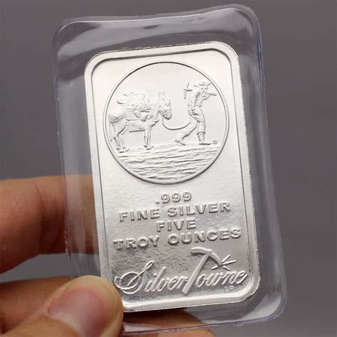 Silvertowne - The American Flag 5oz .999 Silver Bar is a SilverTowne Mint Minted Bullion Product. Located in Winchester, Indiana, The SilverTowne Mint has been manufacturing quality Silver Bullion produced with the Highest Quality Standards since 1973. When purchasing the American Flag 5oz .999 Silver Bar on SilverTowne.com you are buying direct from the source!