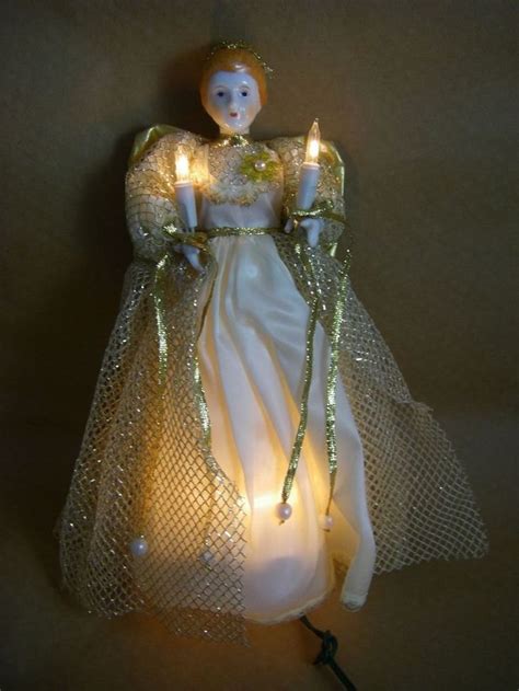 Vintage Victorian Lighted ANGEL Christmas Tree Topper by Silvestri - Gold Lame Red Velvet Dress - Plug In Angel - Tree Table Decor - Gift (2.4k) $ 34.99. Add to ... . 