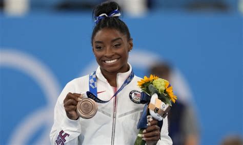 Simone Biles returning to gymnastics competition in August for 1st time since 2020 Olympics