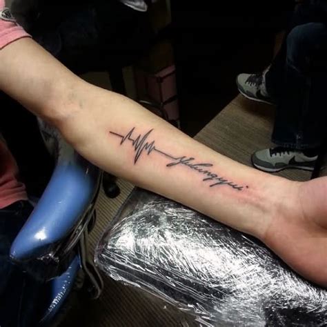 Simple But Amazing Black Ink Heartbeat With Name Tattoo Design On Men