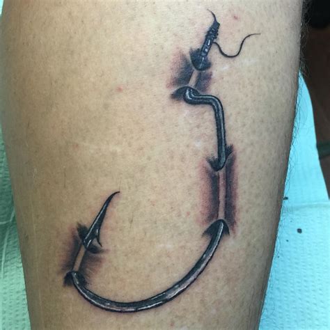 Simple fish hook tattoo. Oct 24, 2017 · A Fish Hook Chest Piece Tattoo, Done Solely In Dark Grey Ink. This one not only shows how nice fish hooks sit across the chest, but they prove that sometimes even simple tattoos can still look great. 5. A Very Deeply Sunken In Fish Hook. Well, this one is certainly shaded well, and also looks extremely painful! 6. 