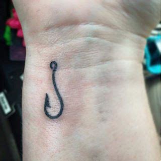 Simple fishing hook tattoo. May 4, 2019 · Bait fishing hooks come in a variety of styles and are the white-bread option of hooks. Most feature barbs on the shaft to hold bait in place. Longer shank hooks are good for teaching kids to fish, while shorter shank ones are often used in snells. The Bass Pro Shops Baitholder hook is one popular bait hook that has a 4.6 star rating. 
